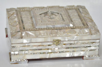 Mother-of-pearl case containing a Bible set in a complementary mother-of-pearl cover, received from the President of the National Palestinian Authority, Yasser Arafat in December of 2000