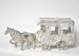 Miniature filigree silver carriage with a pair of drawing horses